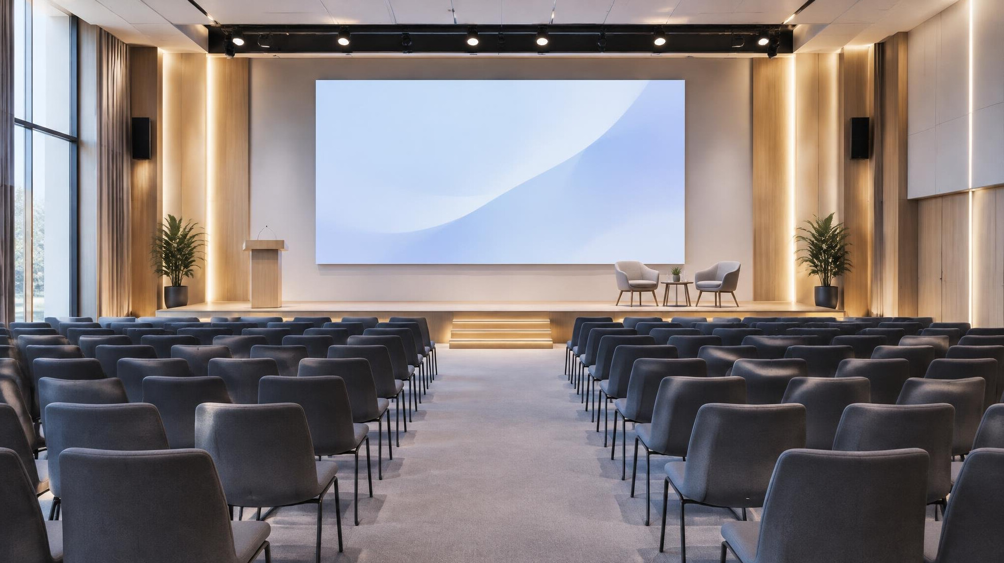 Modern conference hall with rows of empty audience seats